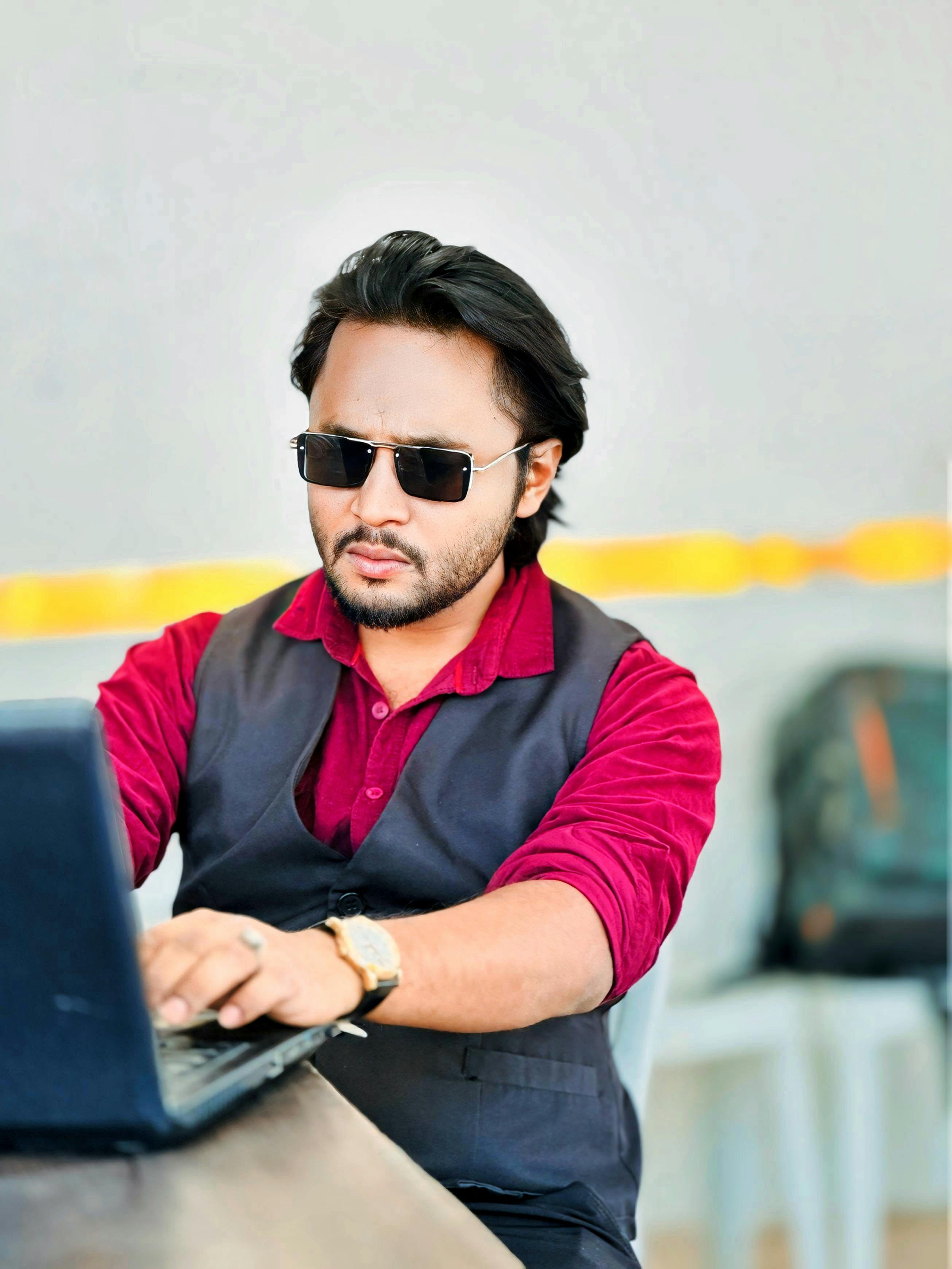 Bangladeshi business owner managing online commerce
