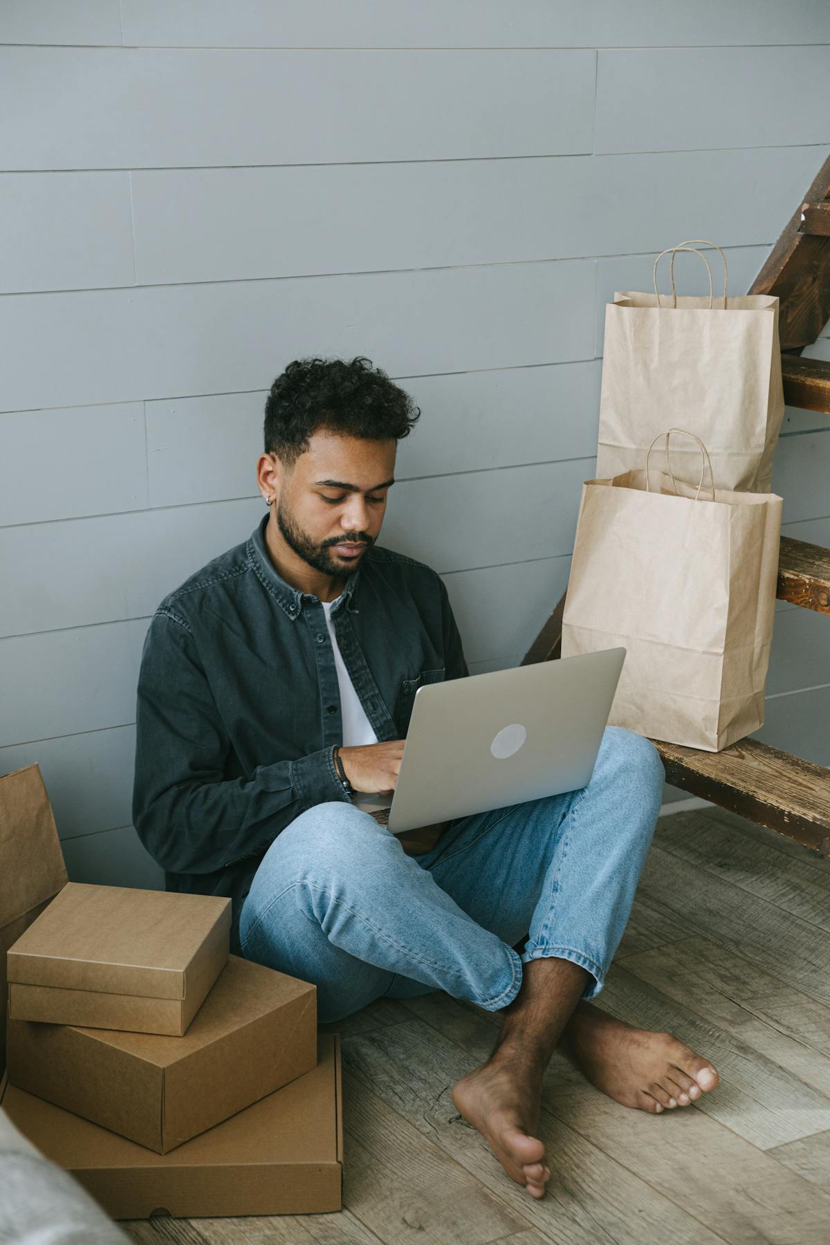 Entrepreneur managing online business with laptop